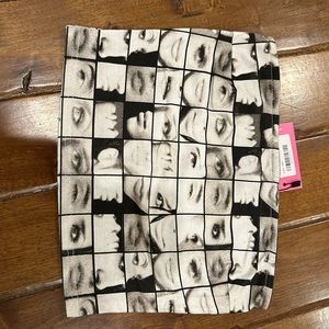 Turn ur phone but tube top newspaper print